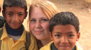 Volunteer with children in Nepal